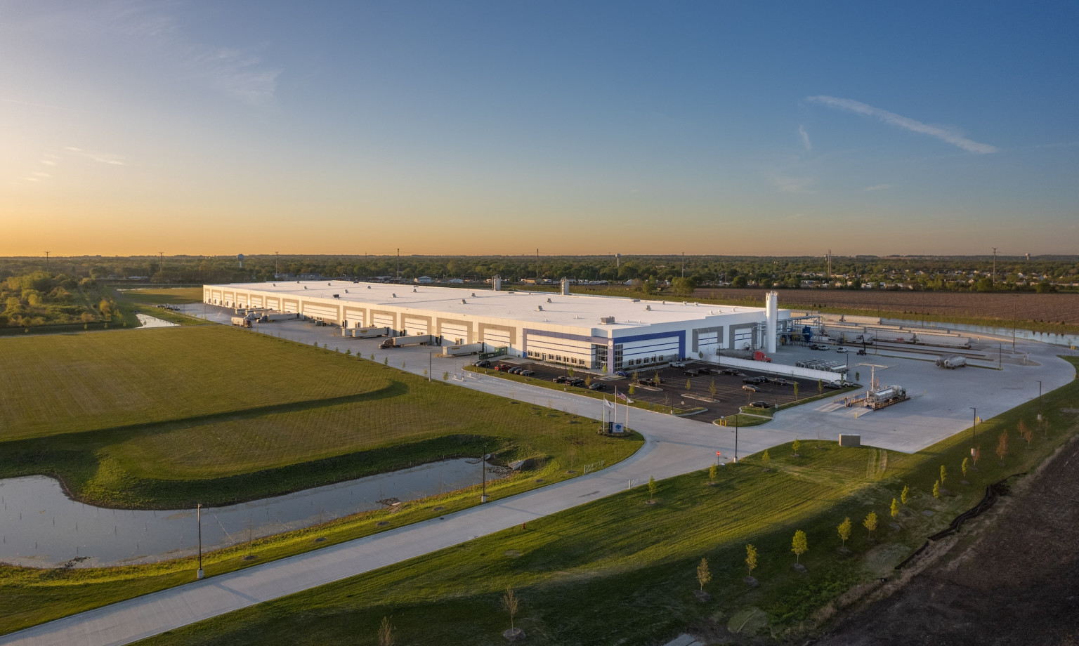Aerial view of a large industrial facility and site work